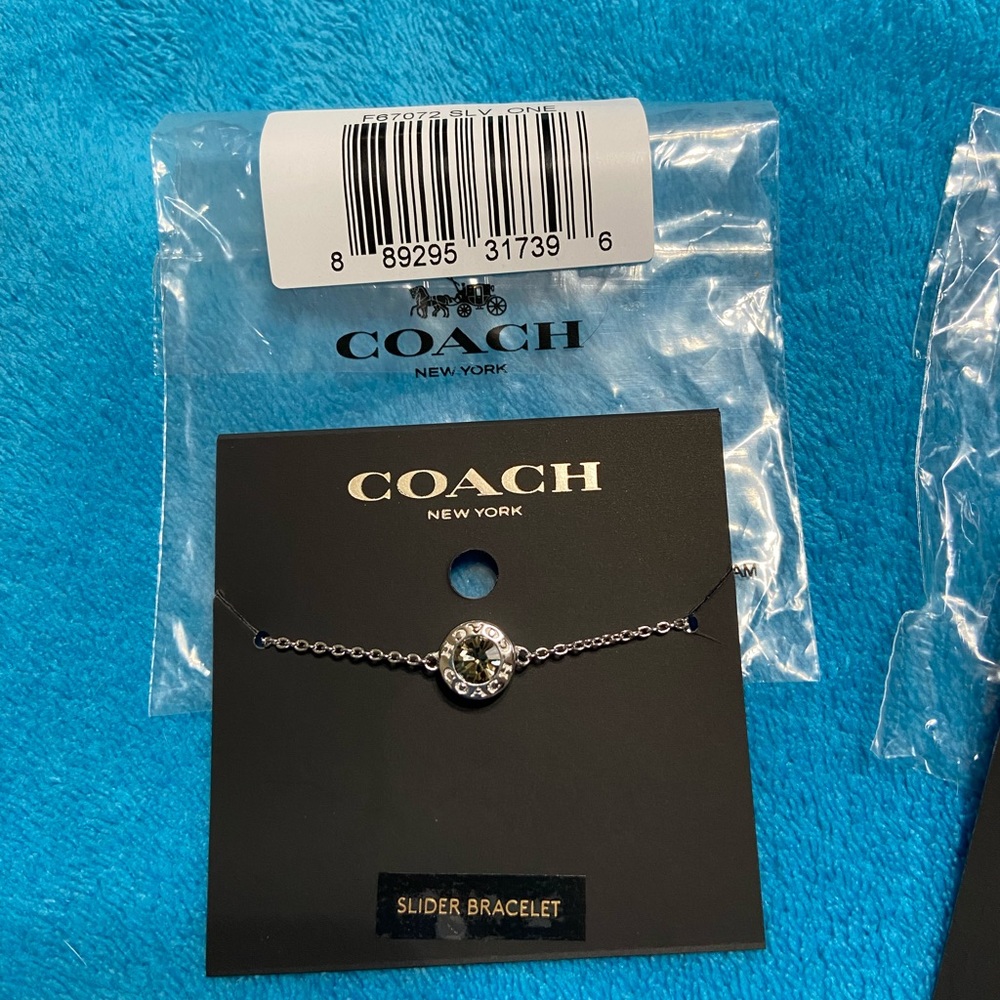 Coach brand new jewelry set. Necklace, earring and bracelet set. - Picture 11 of 11